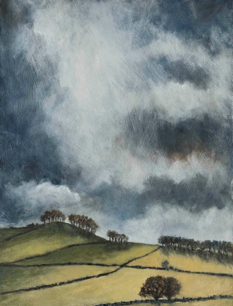 Eccles Pike Derbyshire, Sun shining through clouds onto tree lined hills below